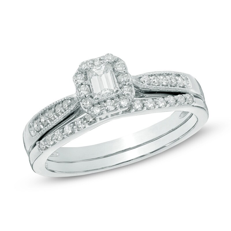 Main Image 1 of Previously Owned - 1/2 CT. T.W. Emerald-Cut Diamond Frame Bridal Set in 10K White Gold