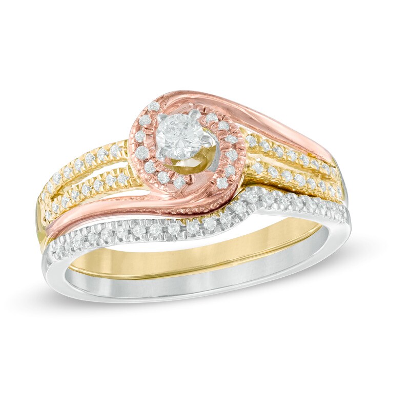 Main Image 1 of Previously Owned - 1/3 CT. T.W. Diamond Swirl Bridal Set in 10K Tri-Tone Gold