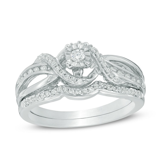 Previously Owned - 1/4 CT. T.w. Diamond Twist Crossover Bridal Set in Sterling Silver