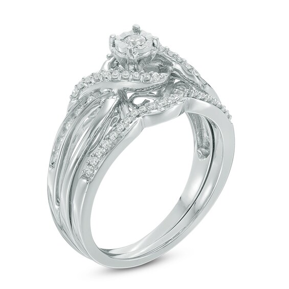 Previously Owned - 1/4 CT. T.w. Diamond Twist Crossover Bridal Set in Sterling Silver