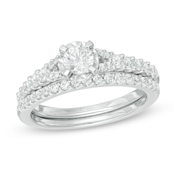 Previously Owned - 3/4 CT. T.w. Diamond Split Shank Bridal Set in 14K White Gold