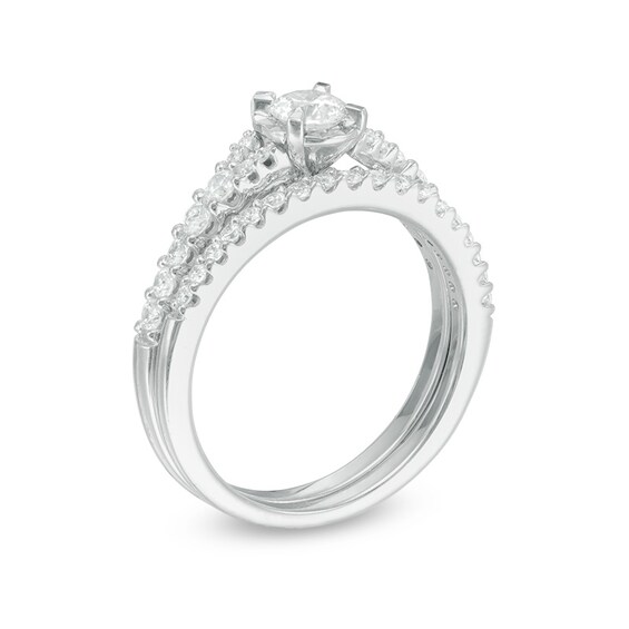 Previously Owned - 3/4 CT. T.w. Diamond Split Shank Bridal Set in 14K White Gold