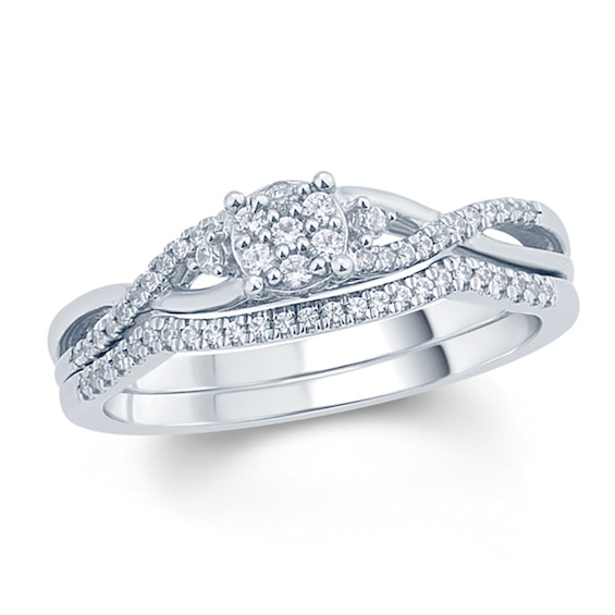 Previously Owned - 1/4 CT. T.w. Composite Diamond Twist Bridal Set in Sterling Silver