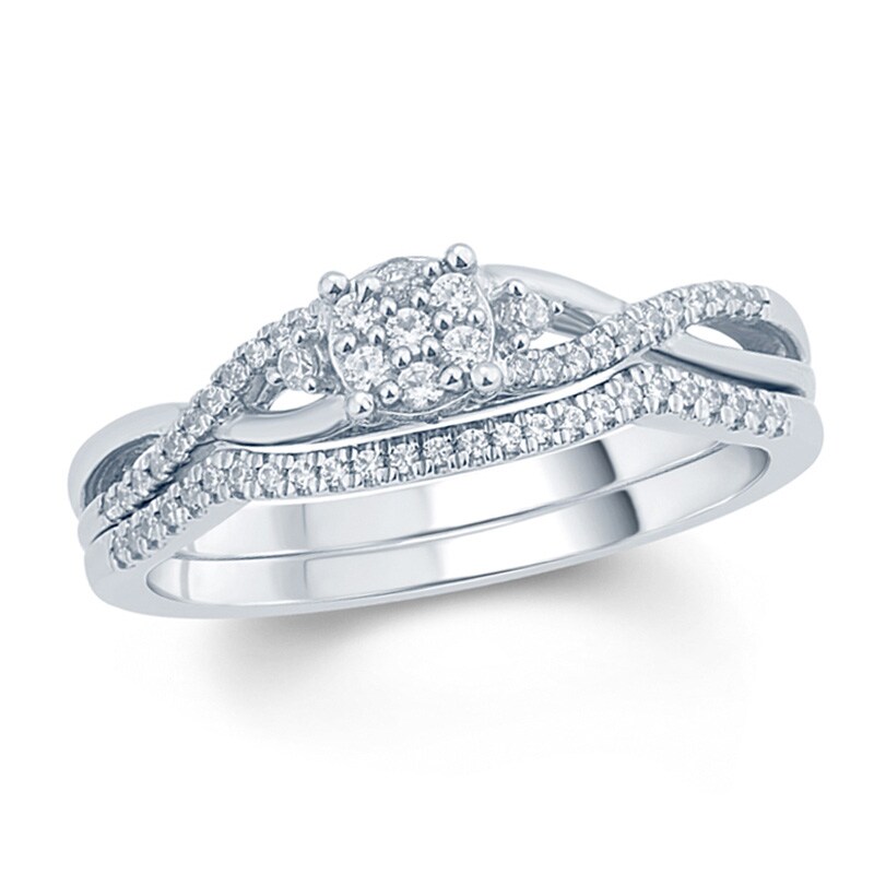 Main Image 1 of Previously Owned - 1/4 CT. T.W. Composite Diamond Twist Bridal Set in Sterling Silver