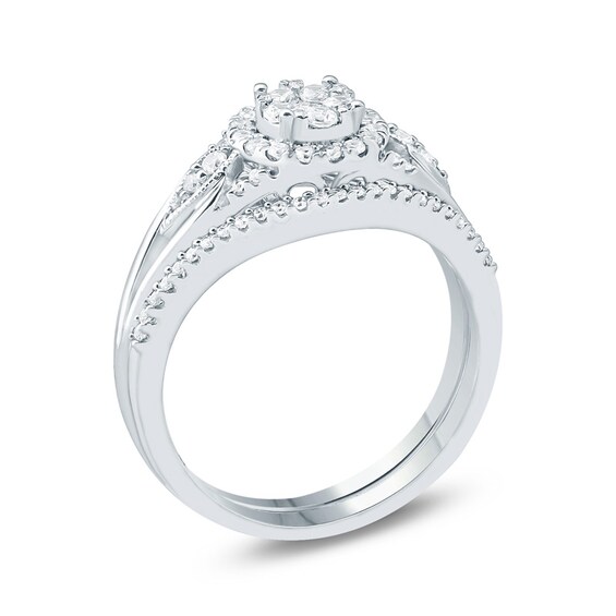 Previously Owned - 1/2 CT. T.w. Composite Diamond Flower Frame Petal-Sides Bridal Set in 10K White Gold