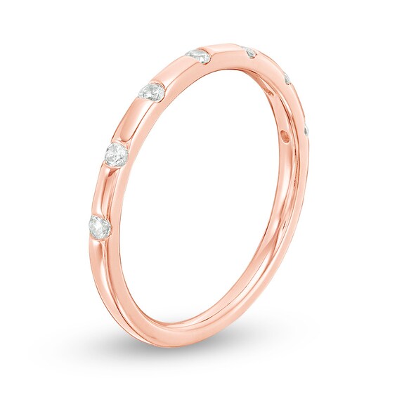 Previously Owned - 1/8 CT. T.w. Diamond Seven Stone Station Anniversary Band in 10K Rose Gold