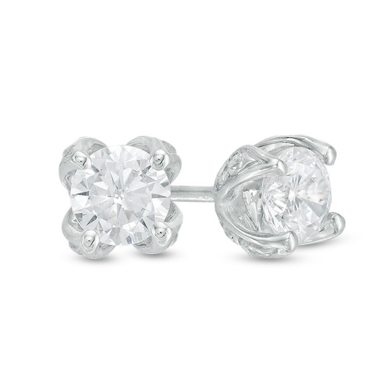 Previously Owned - Love's Destiny by Peoples 5/8 CT. T.w. Diamond Solitaire Stud Earrings in 14K White Gold (I/I2)