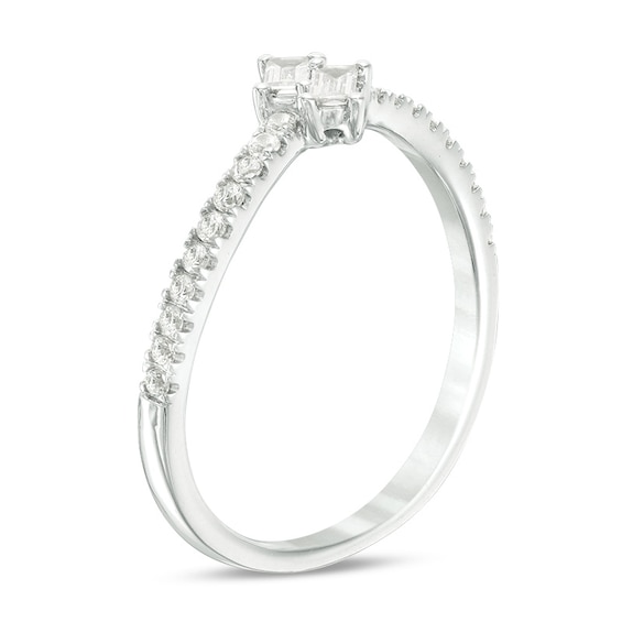 Previously Owned - Ever UsÂ® 1/4 CT. T.w. Two-Stone Baguette Diamond Slant Bypass Ring in 10K White Gold
