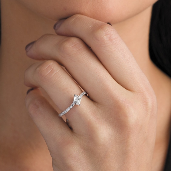 Previously Owned - Ever UsÂ® 1/4 CT. T.w. Two-Stone Baguette Diamond Slant Bypass Ring in 10K White Gold