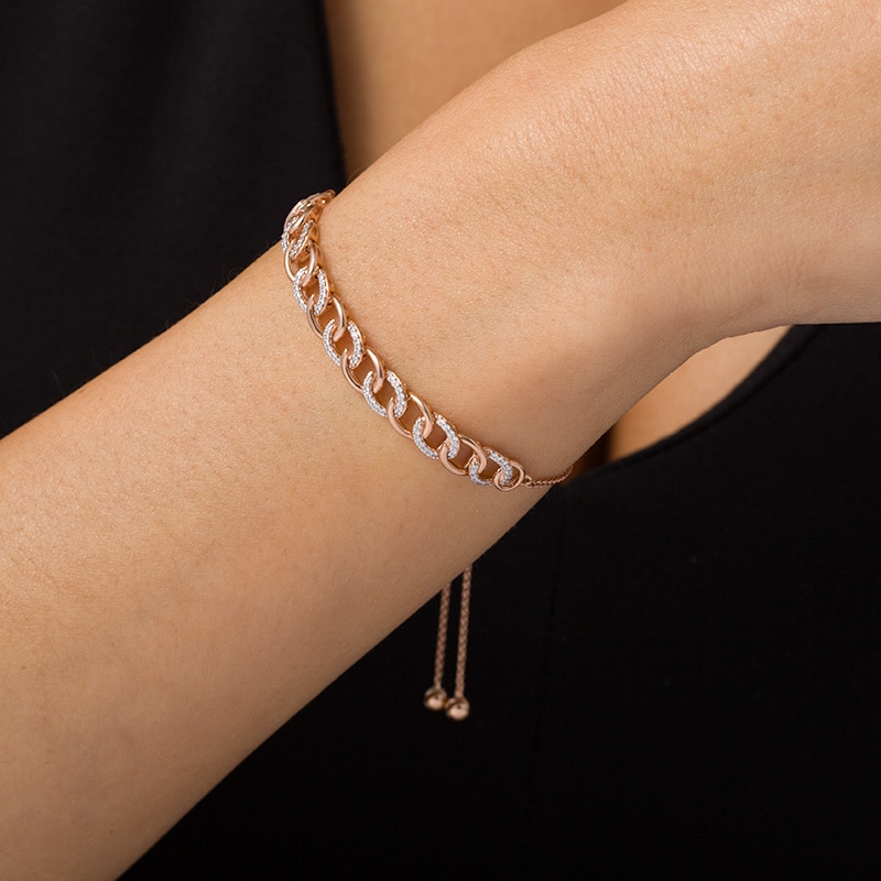 Previously Owned - 1/4 CT. T.W. Diamond Interlocking Curb Link Bolo Bracelet in 10K Rose Gold - 9.5"