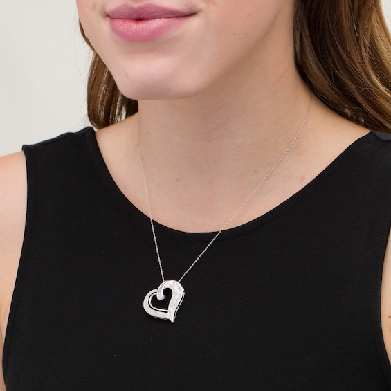 Previously Owned - 1 CT. T.w. Diamond Tilted Heart Pendant in 10K White Gold