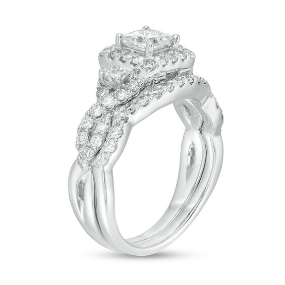 Previously Owned - 1-1/2 CT. T.w. Princess-Cut Diamond Three Stone Frame Twist Bridal Set in 10K White Gold