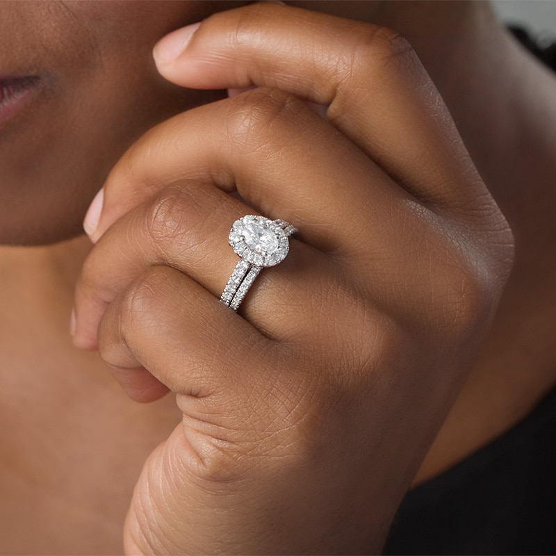 Main Image 3 of Previously Owned - Celebration Ideal 1-1/2 CT. T.W. Oval Diamond Frame Bridal Set in 14K White Gold (I/I1)