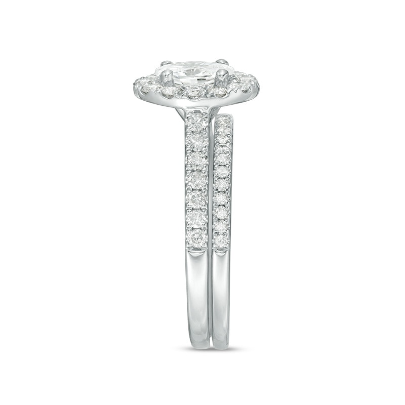 Main Image 4 of Previously Owned - Celebration Ideal 1-1/2 CT. T.W. Oval Diamond Frame Bridal Set in 14K White Gold (I/I1)