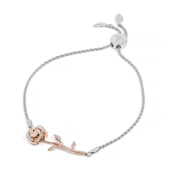 Previously Owned - Enchanted Disney Belle 1/10 CT. T.w. Diamond Bracelet in Sterling Silver and 10K Rose Gold - 8.5"