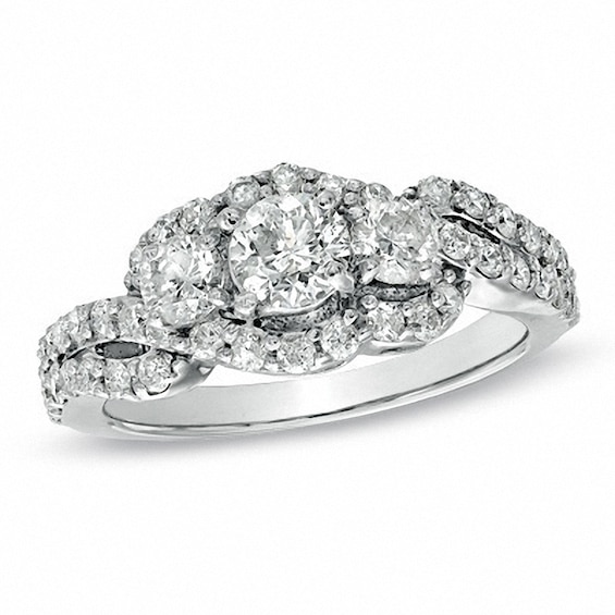 Previously Owned - 1-1/2 CT. T.w. Diamond Three Stone Frame Ring in PlatinaireÂ®