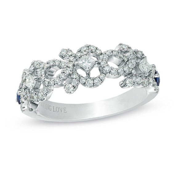 Previously Owned - Vera Wang Love Collection 1/2 CT. T.w. Diamond and Blue Sapphire Curlique Band in 14K White Gold