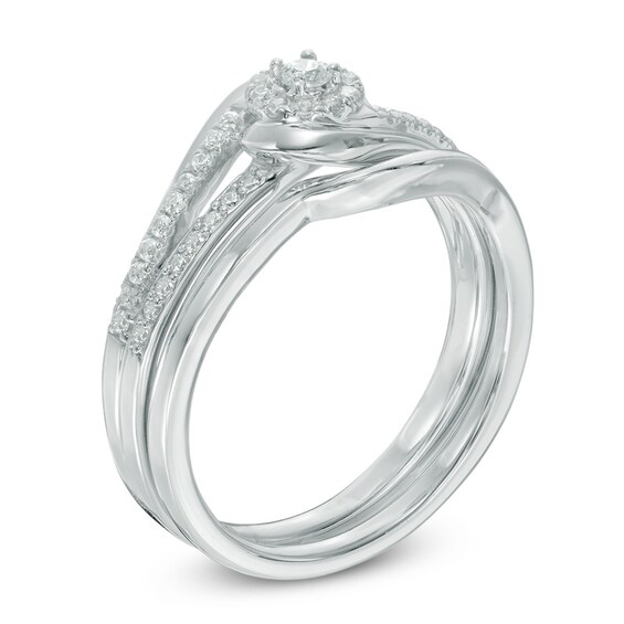 Previously Owned - 1/4 CT. T.w. Diamond Swirl Frame Bridal Set in 10K White Gold