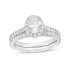 Thumbnail Image 1 of Previously Owned - 1-1/5 CT. T.W.   Oval center Diamond Frame Bridal Set in 14K White Gold (I/SI2)