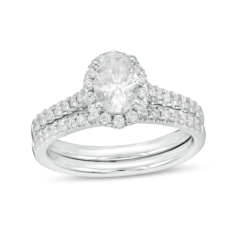 Main Image 1 of Previously Owned - 1-1/5 CT. T.W.   Oval center Diamond Frame Bridal Set in 14K White Gold (I/SI2)