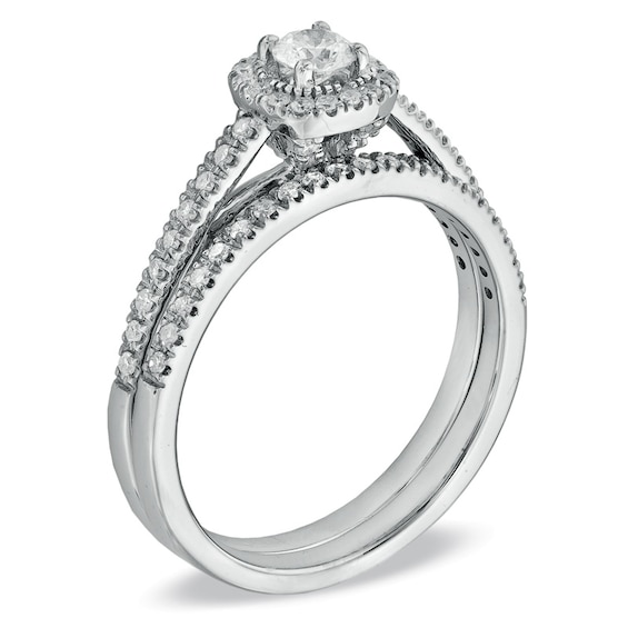 Previously Owned - 1/2 CT. T.w. Diamond Frame Bridal Set in 14K White Gold