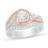 Thumbnail Image 1 of Previously Owned - 1 CT. T.W. Diamond Layered Bypass Swirl Bridal Set in 14K Two-Tone Gold