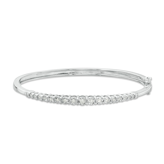 Previously Owned - 1/4 CT. T.w. Diamond Graduated Bangle in Sterling Silver