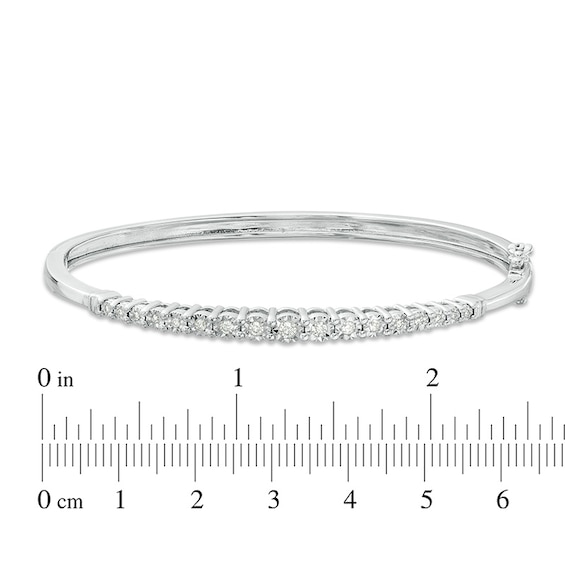 Previously Owned - 1/4 CT. T.w. Diamond Graduated Bangle in Sterling Silver