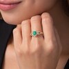 Thumbnail Image 2 of Previously Owned - Oval Emerald and 1/5 CT. T.W. Diamond Frame Scrolling Split Shank Ring in 10K Gold