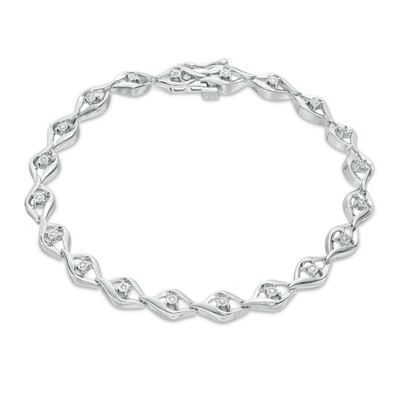 Previously Owned - 1/10 CT. T.w. Diamond Open Flame Link Bracelet in Sterling Silver - 7.25"