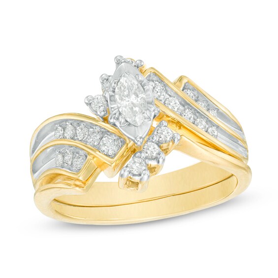 Previously Owned - 3/4 CT. T.w. Diamond Bypass Slant Wedding Ensemble in 14K Gold