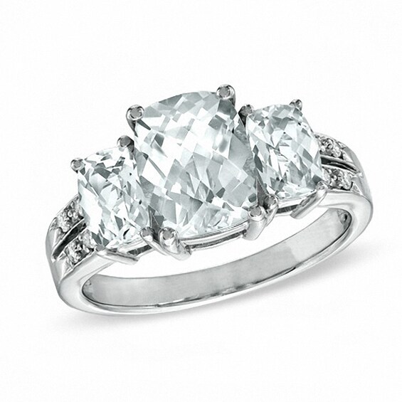 Previously Owned - Faceted Lab-Created White Sapphire and Diamond Accent Three Stone Ring in 10K White Gold