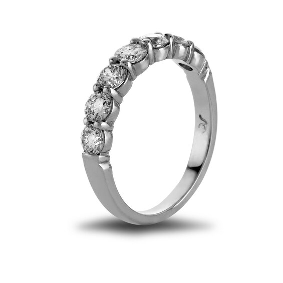 Previously Owned - 3/4 CT. T.w. Diamond Seven Stone Wedding Band in Platinum (H/Si1)