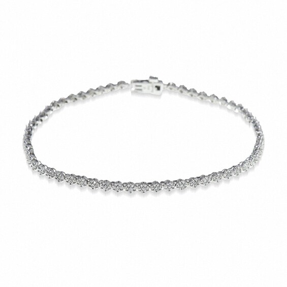 Previously Owned - 1 CT. T.w. Diamond Flower Tennis Bracelet in 10K White Gold