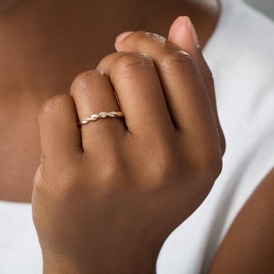 Previously Owned - 1/20 CT. T.w. Diamond Twist Wedding Band in 10K Rose Gold
