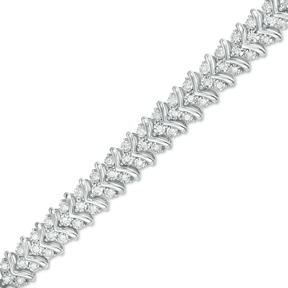 Previously Owned - 1 CT. T.w. Diamond Three Stone Chevron Bracelet in Sterling Silver - 7.5"