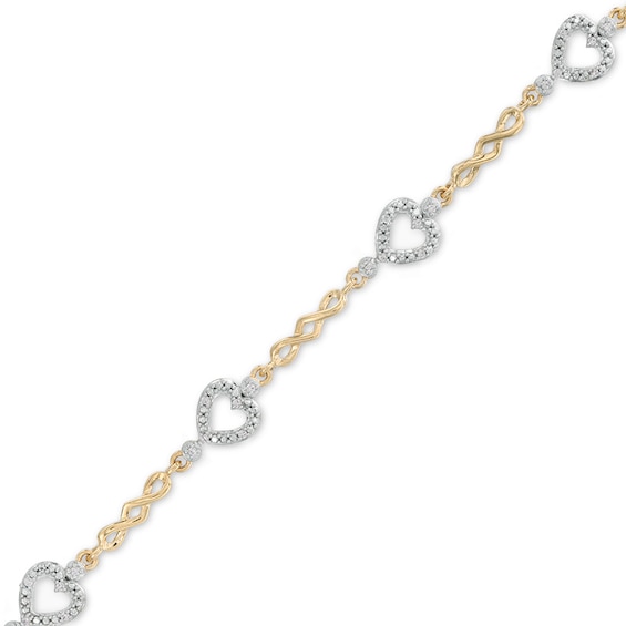 Previously Owned - 1/10 CT. T.w. Diamond Sideways Heart Station Twist Bracelet in 10K Gold - 7.5"