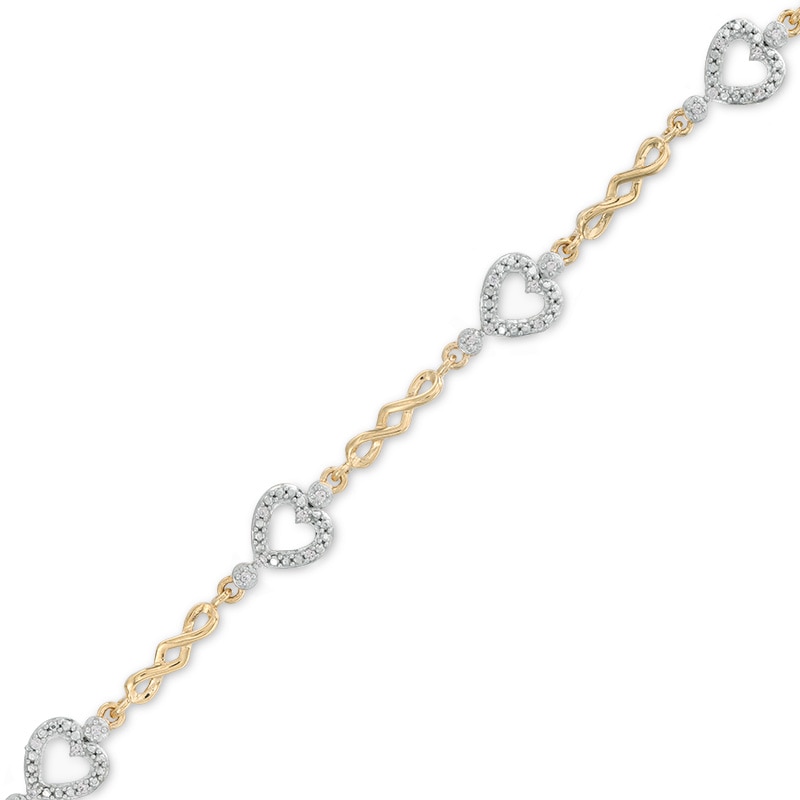 Main Image 1 of Previously Owned - 1/10 CT. T.W. Diamond Sideways Heart Station Twist Bracelet in 10K Gold - 7.5"