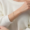 Thumbnail Image 2 of Previously Owned - 1/10 CT. T.W. Diamond Sideways Heart Station Twist Bracelet in 10K Gold - 7.5"