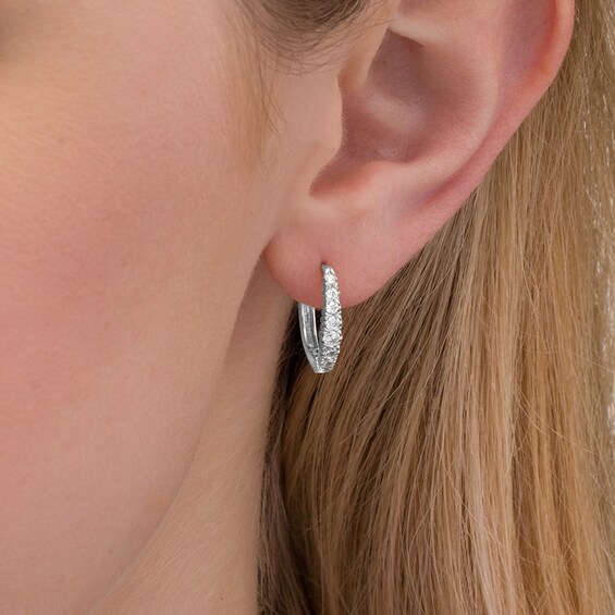 Previously Owned - 1/2 CT. T.w. Diamond Oval Hoop Earrings in 10K White Gold