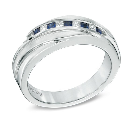 Previously Owned - Vera Wang Men's Blue Sapphire and 1/6 CT. T.w. Diamond Slant Band in 14K White Gold