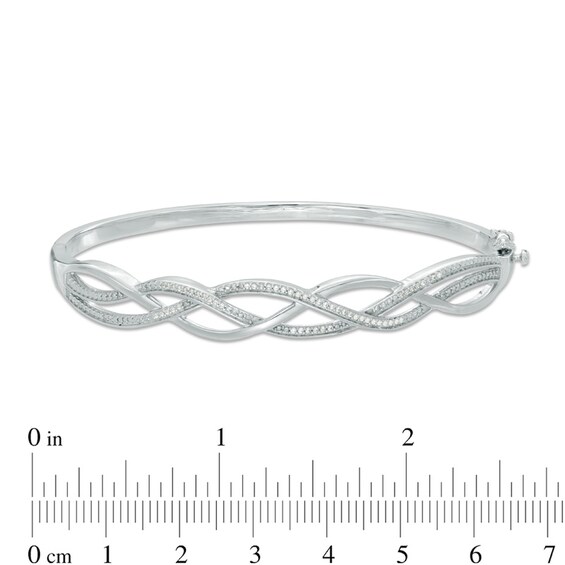 Previously Owned - 1/3 CT. T.w. Diamond Loose Braid Bangle in Sterling Silver