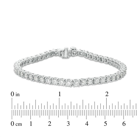 Previously Owned - 3 CT. T.w. Diamond Tennis Bracelet in 14K White Gold - 7.25"