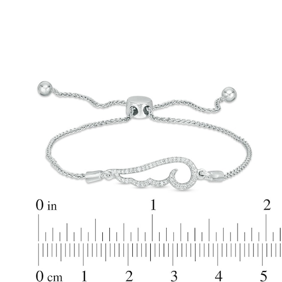 Previously Owned - 1/20 CT. T.w. Diamond Sideways Angel Wing Bolo Bracelet in Sterling Silver - 9.5"