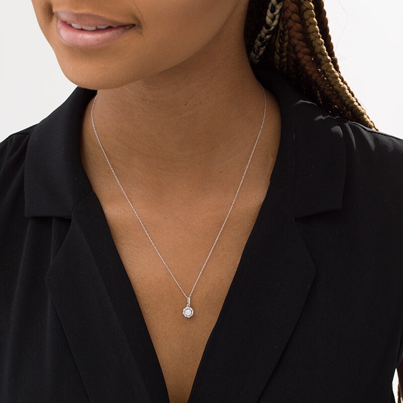 Main Image 2 of Previously Owned - 1/4 CT. T.W. Diamond Twist Frame Pendant in 10K White Gold