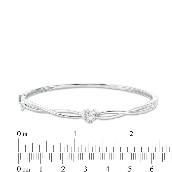 Previously Owned - 1/10 CT. T.w. Diamond Heart Knot Bangle in Sterling Silver