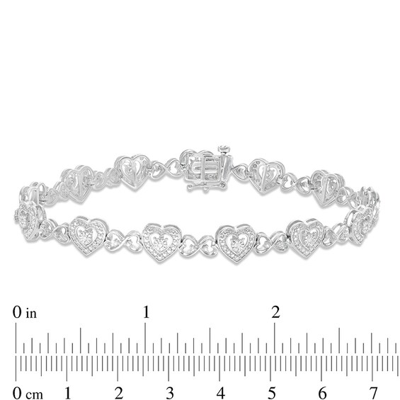 Previously Owned - 1/4 CT. T.w. Diamond Hearts Line Bracelet in Sterling Silver
