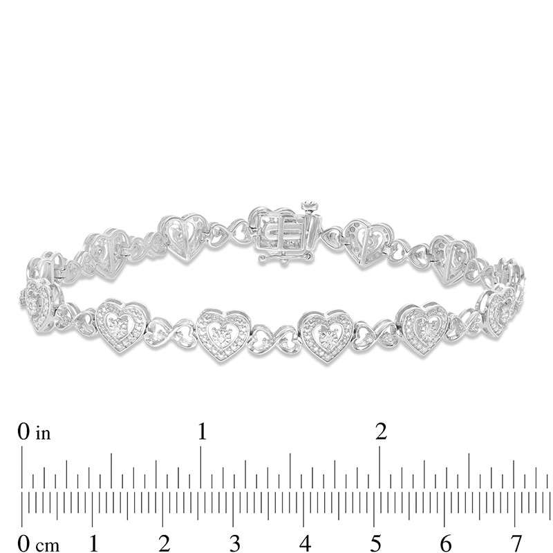 Main Image 4 of Previously Owned - 1/4 CT. T.W. Diamond Hearts Line Bracelet in Sterling Silver