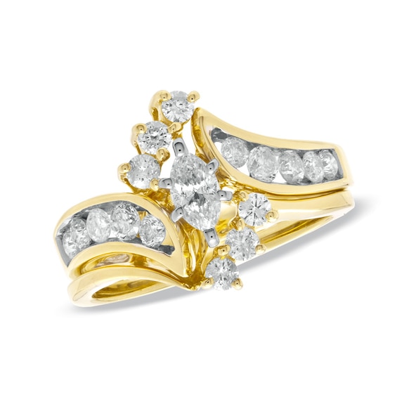 Previously Owned 1 CT. T.w. Marquise Diamond Soldered Bridal Set in 14K Gold with Diamond Accents