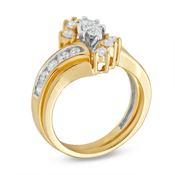 Previously Owned 1 CT. T.w. Marquise Diamond Soldered Bridal Set in 14K Gold with Diamond Accents